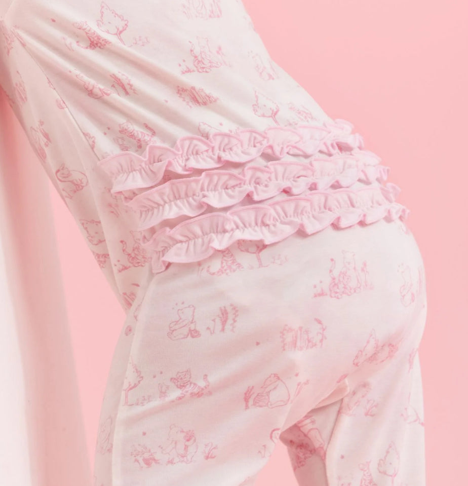 Winnie the Pooh in the woods pink footie
