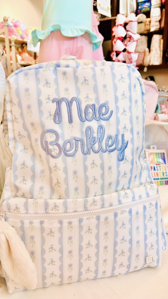 TRVL Blue Stripe Ribbon Floral Backpack