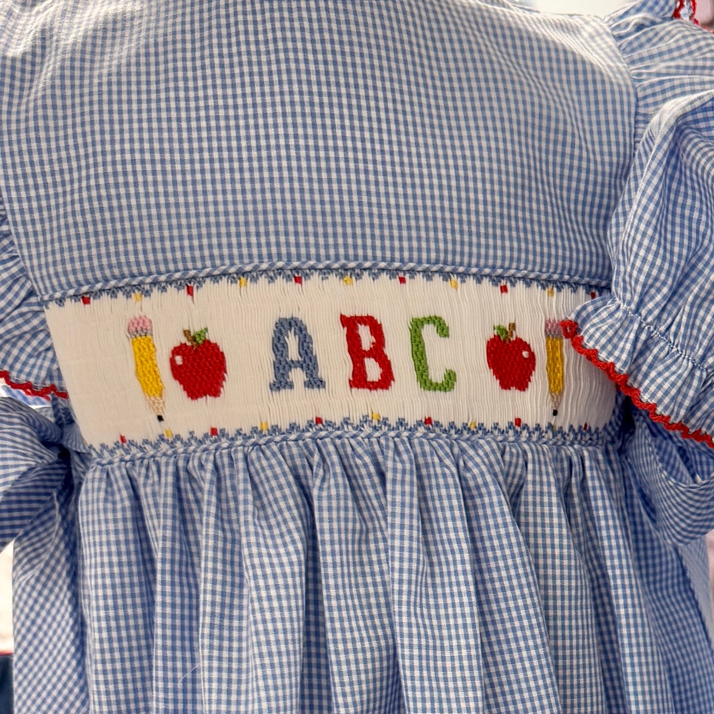 ABC Smocked Apron Dress