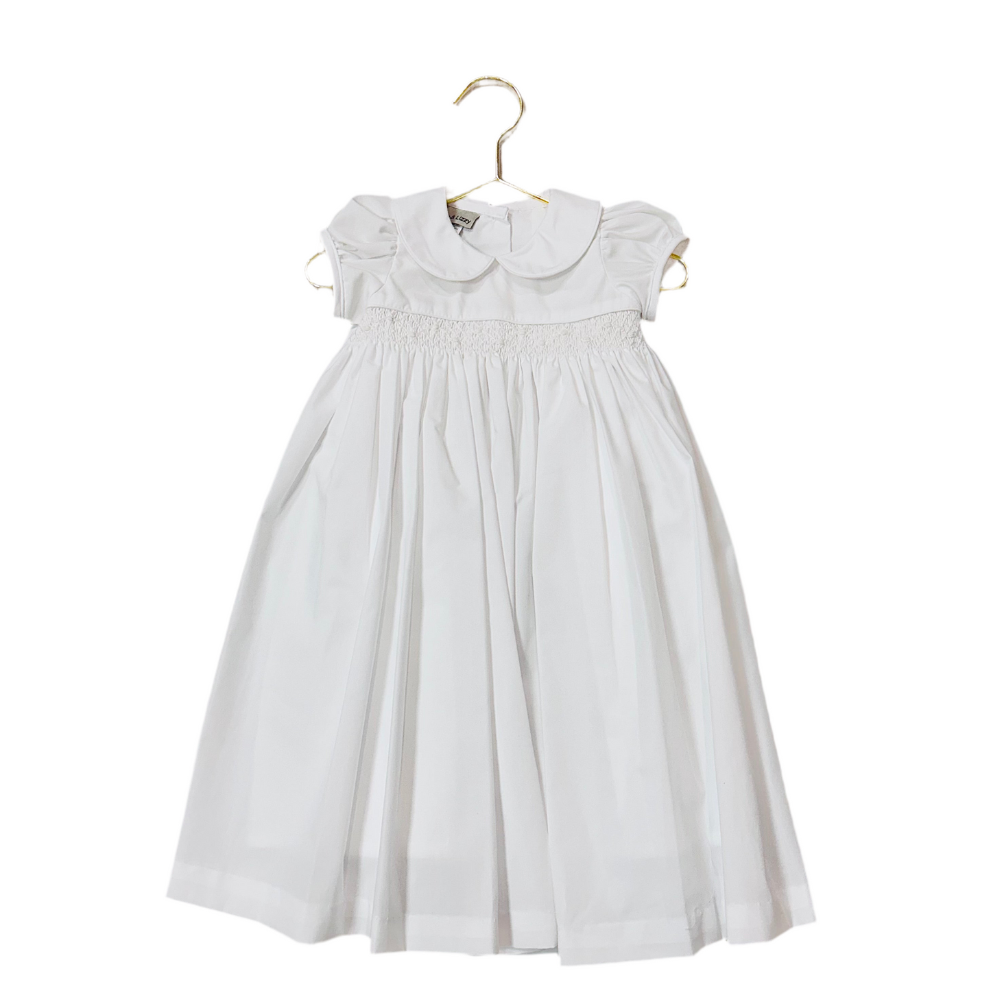 Megan’s White Smocked Dress