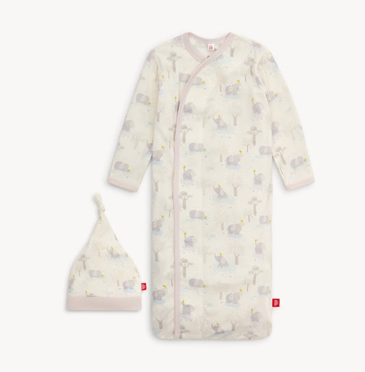 A beige elephant sleeper gown with matching hat, featuring a pattern of elephants and leaves.